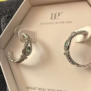 Mint green tourmaline on rhodium